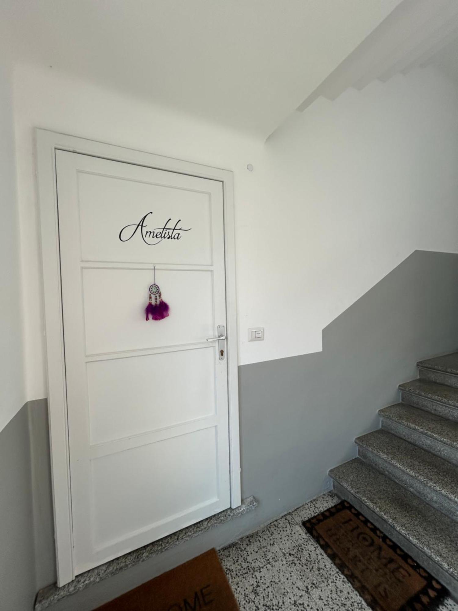 Acchiappasogni Holiday House Malgrate Bagian luar foto